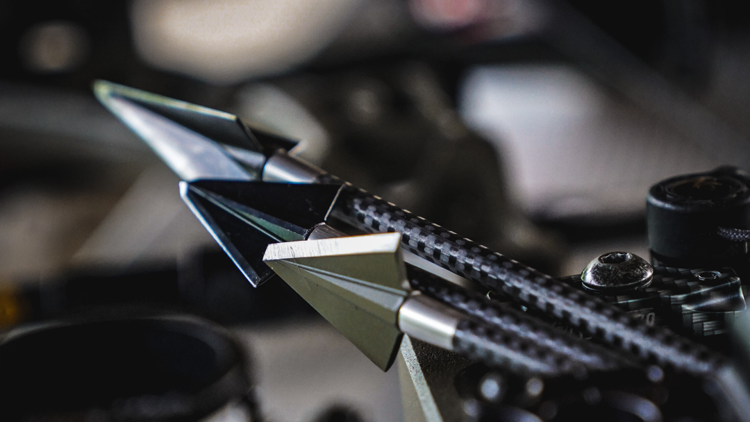 VPA fixed-blade broadheads, two 2-blades and a 3-blade, on carbon arrows in a bow quiver